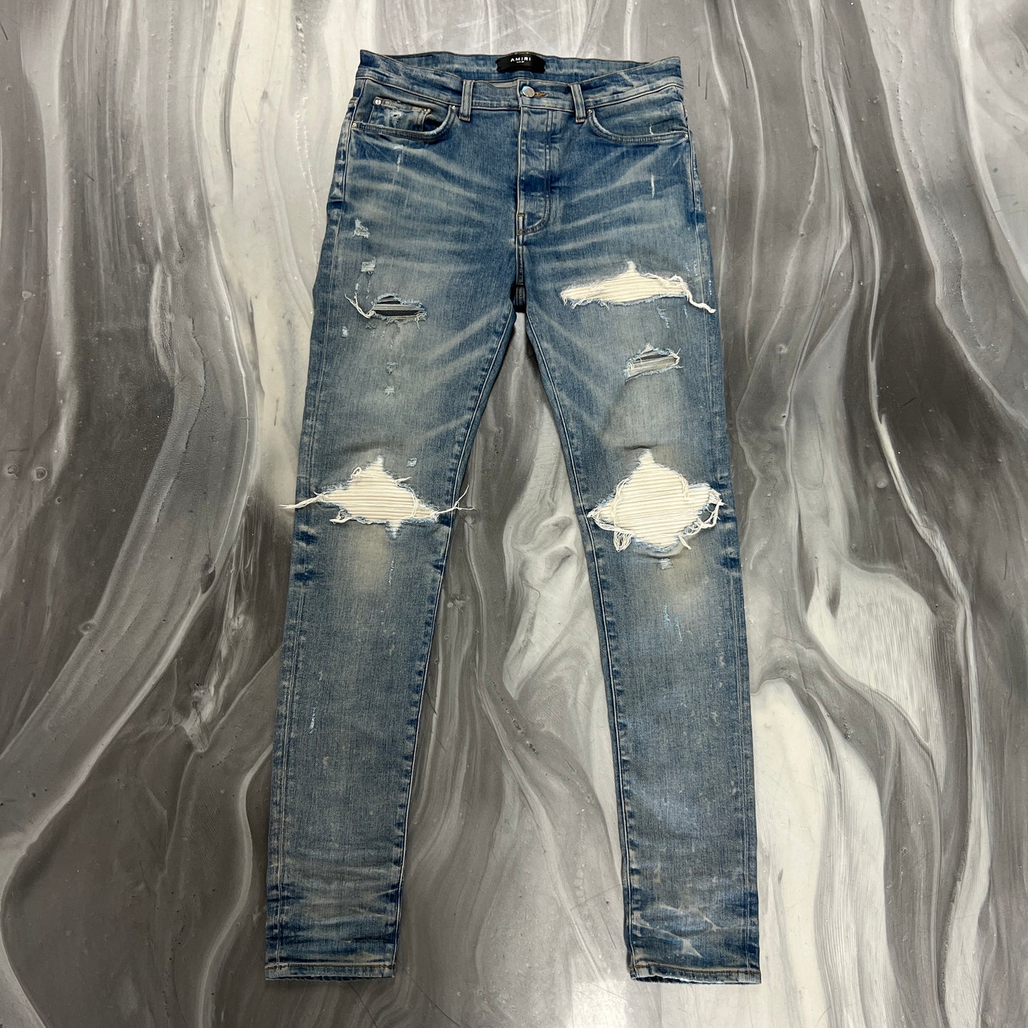 Amiri White Patch MX1 Light Wash Denim Jeans