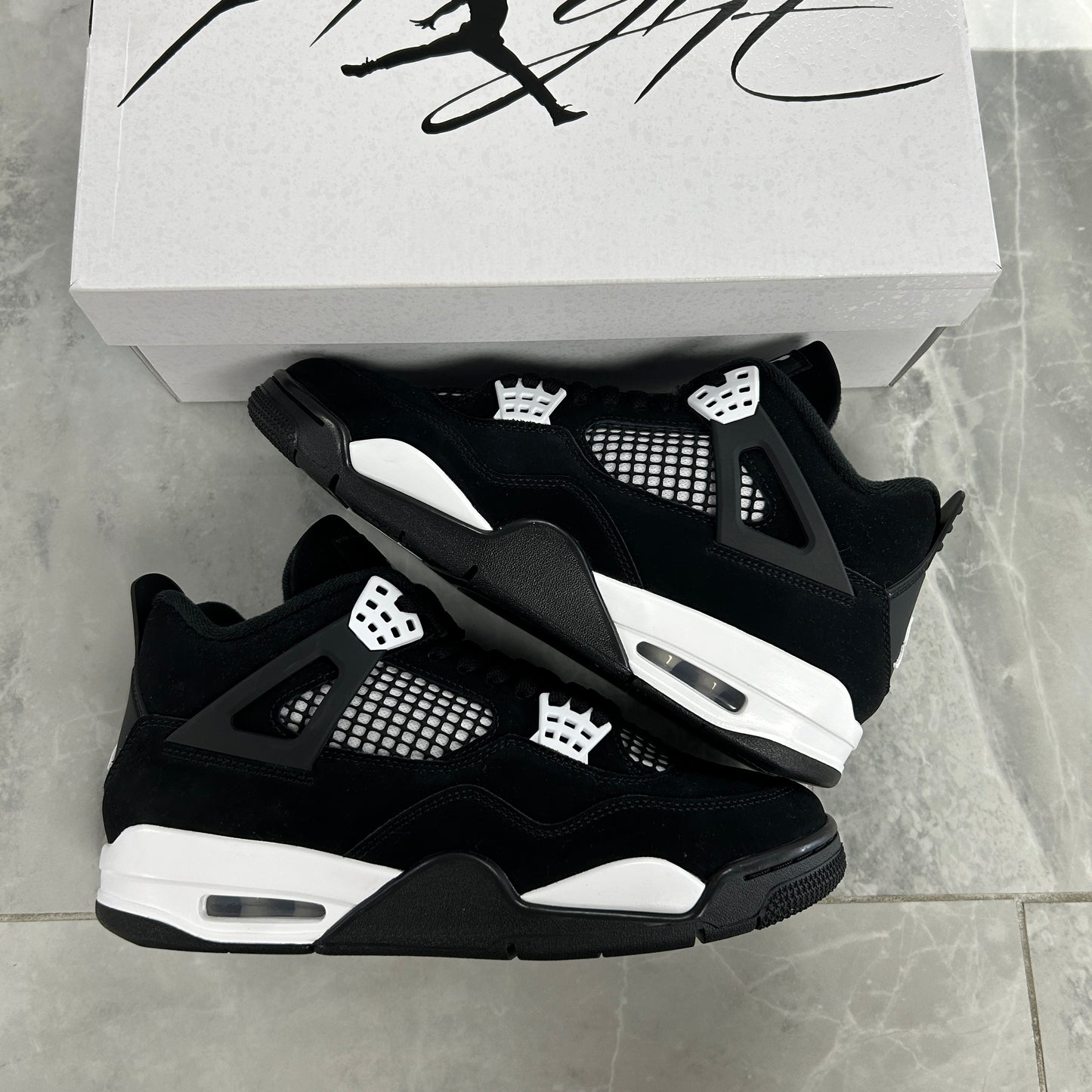 Jordan 4 Retro White Thunder (Used)