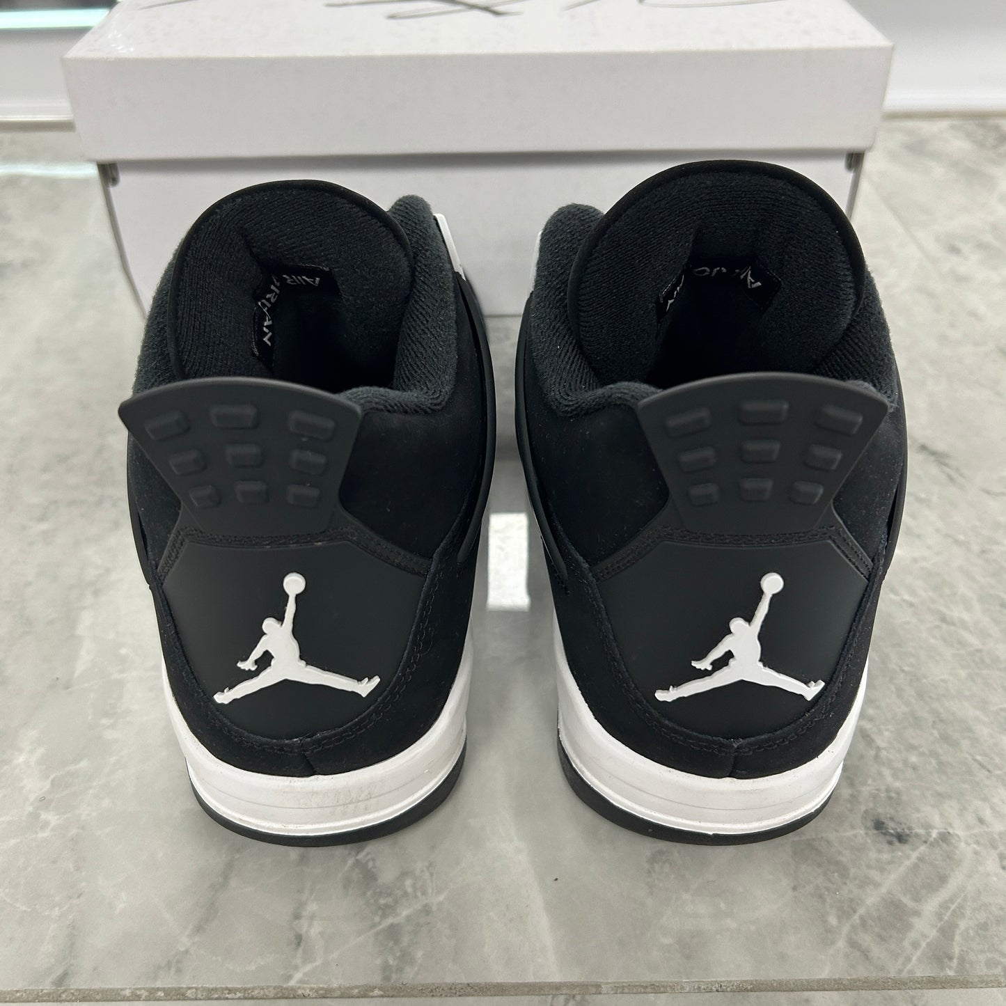 Jordan 4 Retro White Thunder (Used)