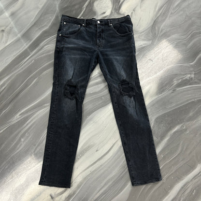 Purple Brand P002 distressed denim jeans in black — view 2