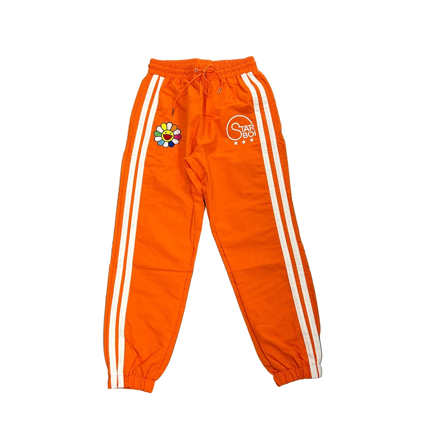 Starboi orange track pants