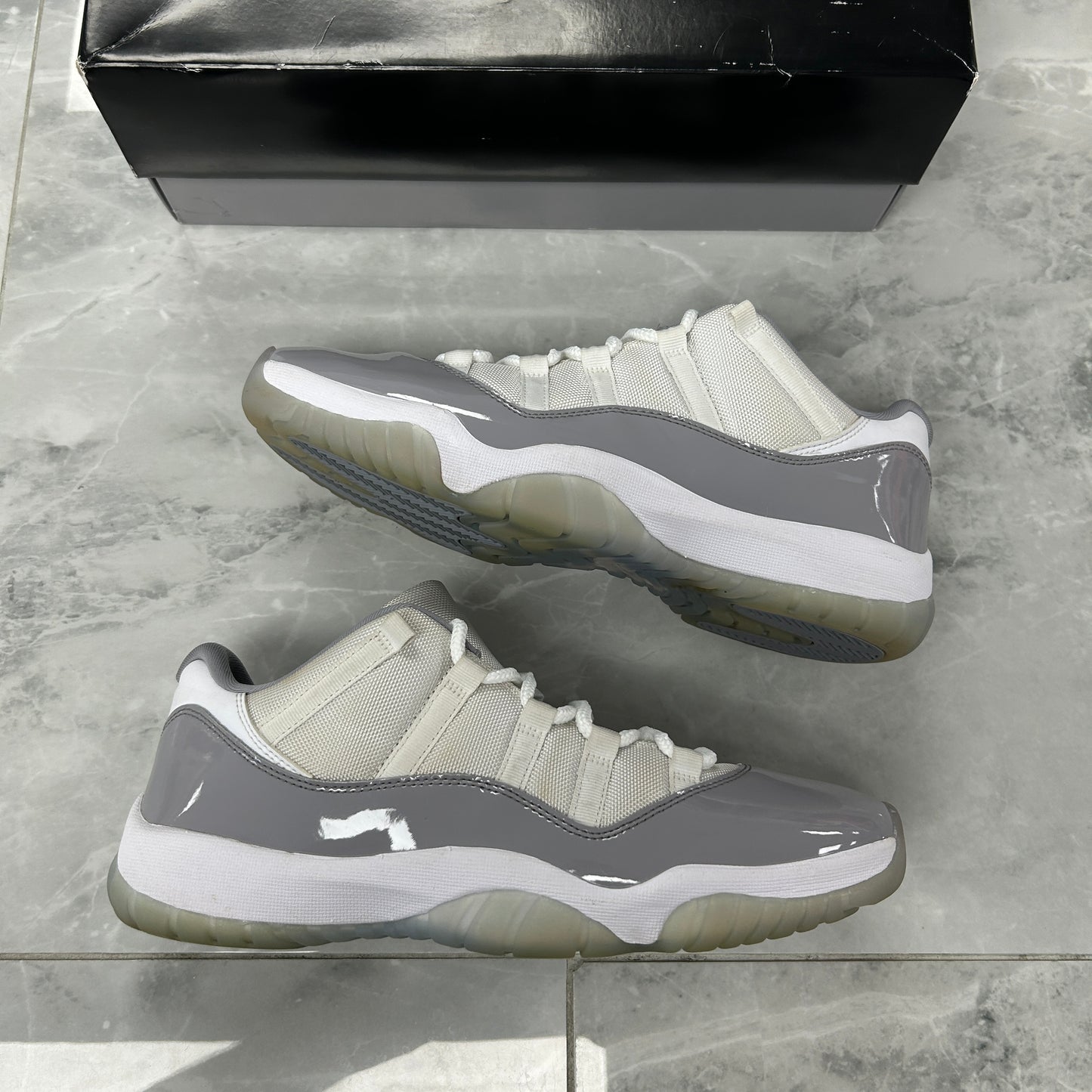 Air Jordan 11 Retro Low Cement
Grey (USED)