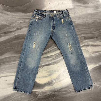 Vintage Levi 501 Distressed Denim Jeans
